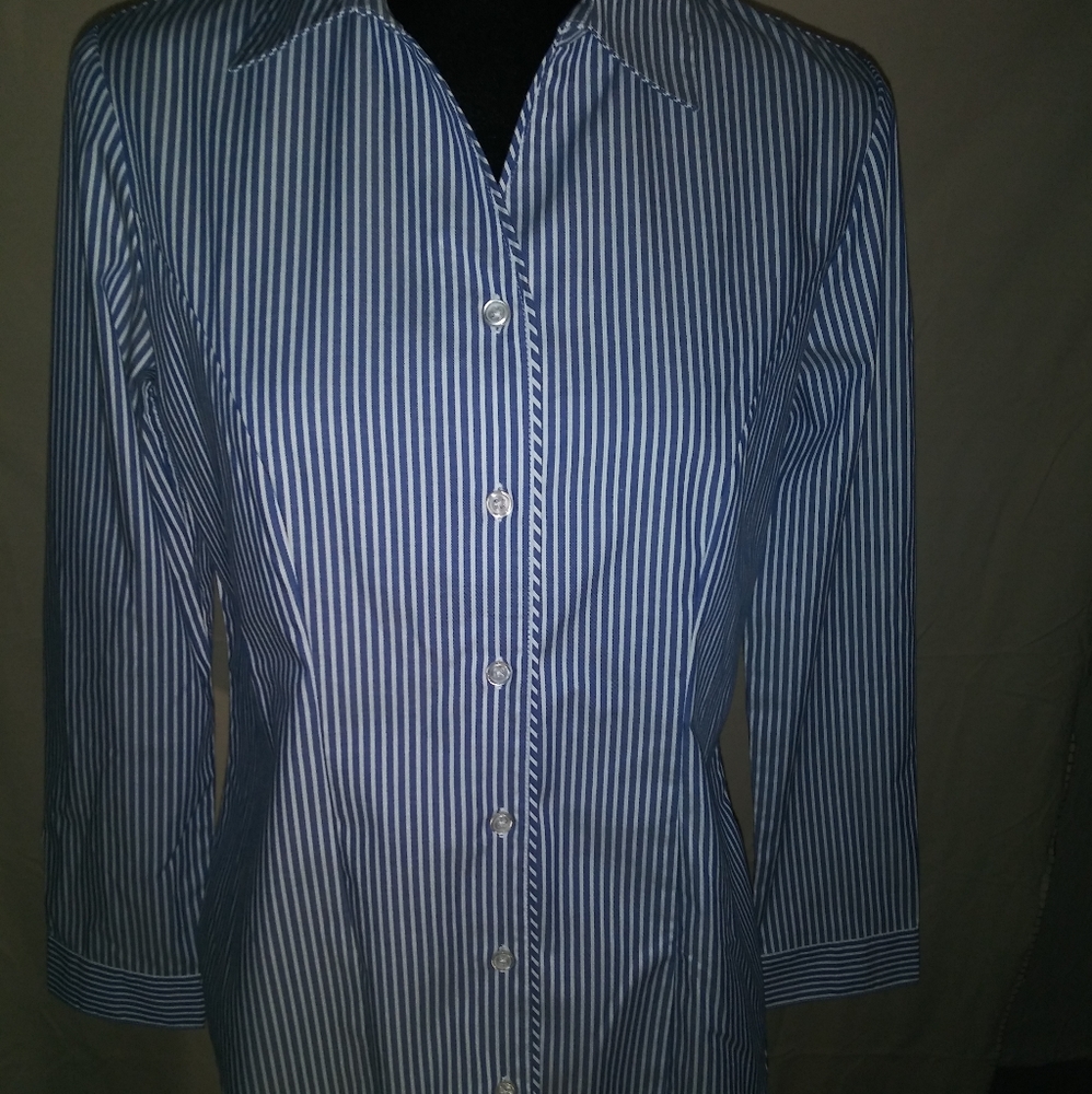 Women's shirt size Petite small.